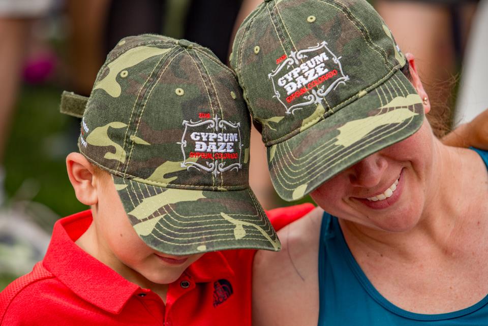 people wearing gypsum daze hats at the gypsum daze parade 