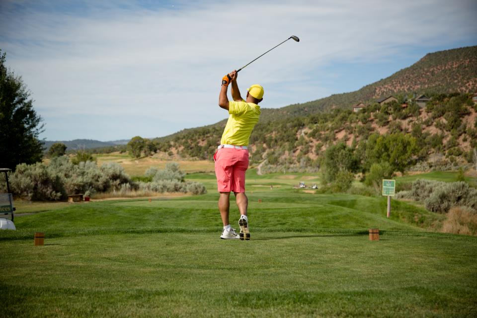 person driving the ball at Gypsum Golf Course