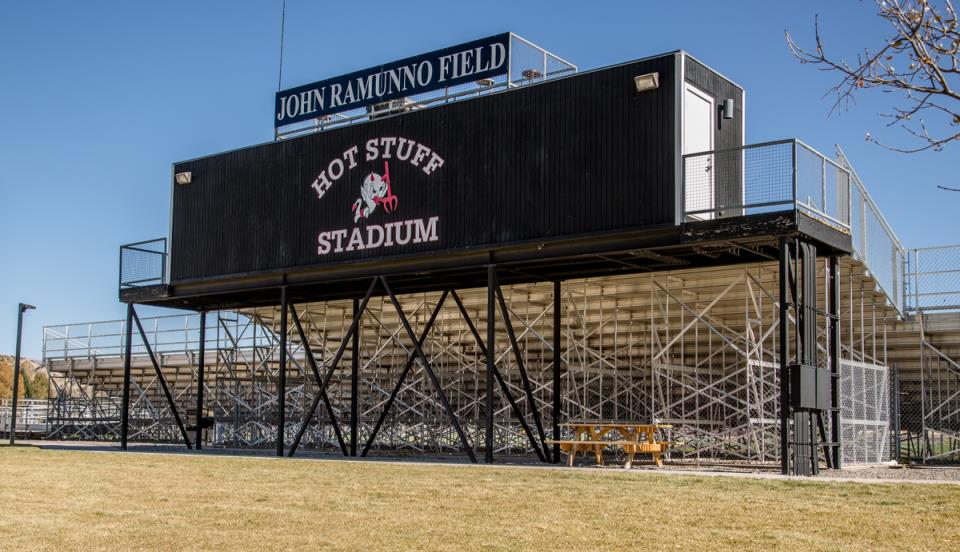 behind the bleachers of john ramunno field